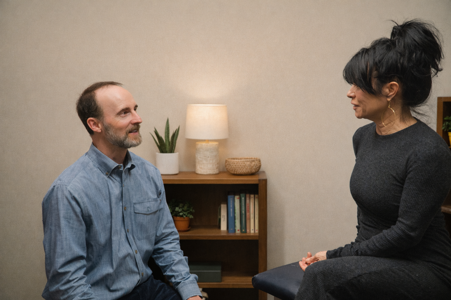 Barrett Chaffin, NP consulting with a patient at Creating Health & Wellness